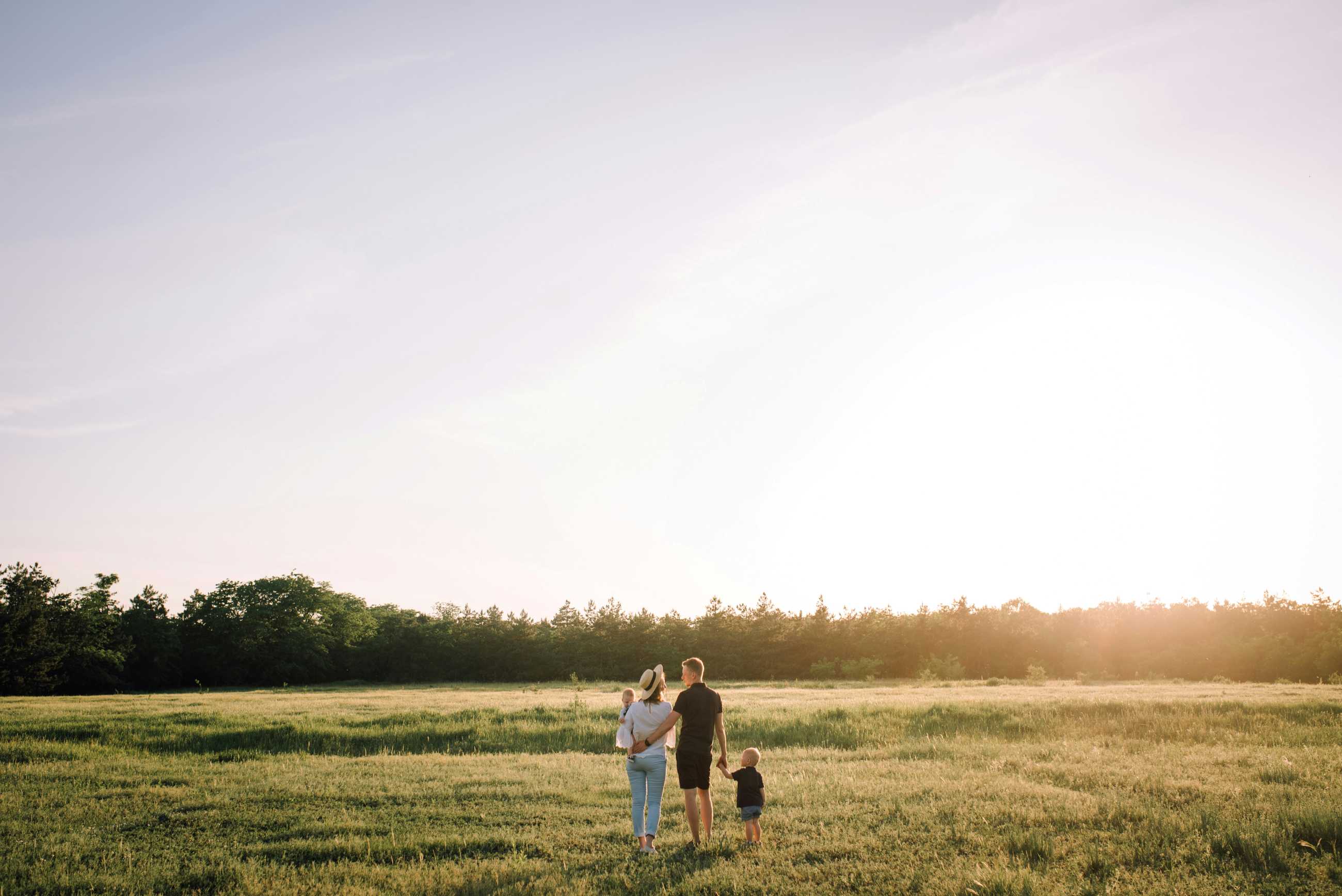 Family in grass background